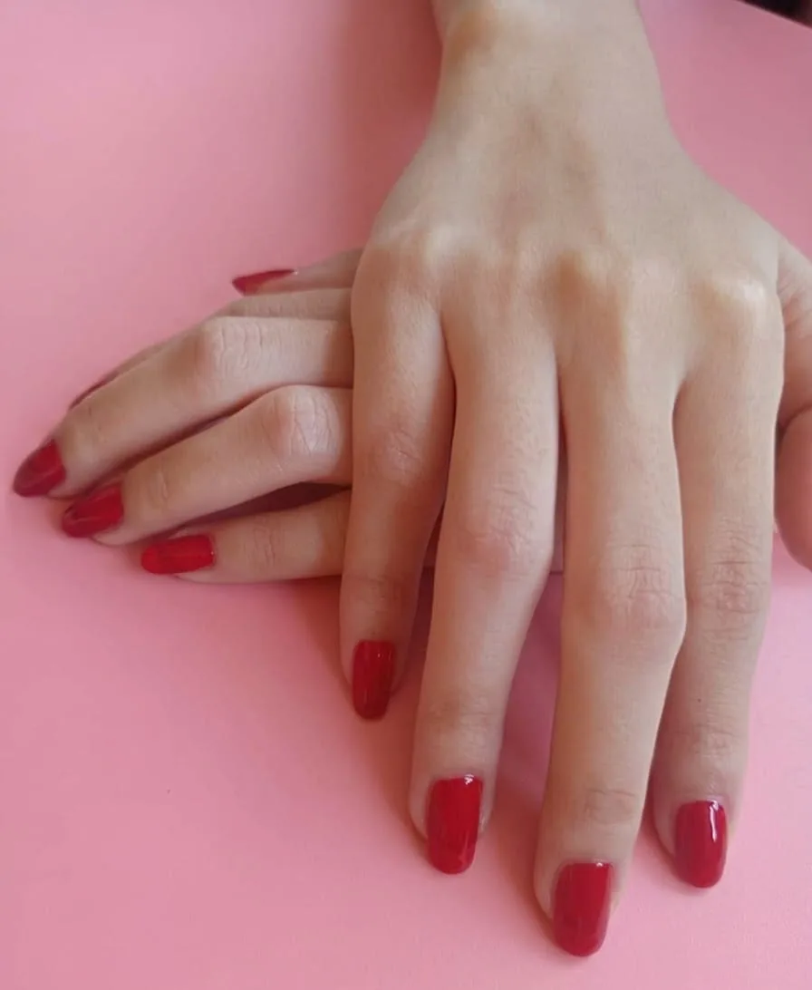 Glossy red nails
