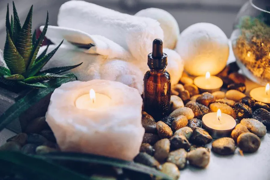 Massage oils and candles for aromatherapy treatment